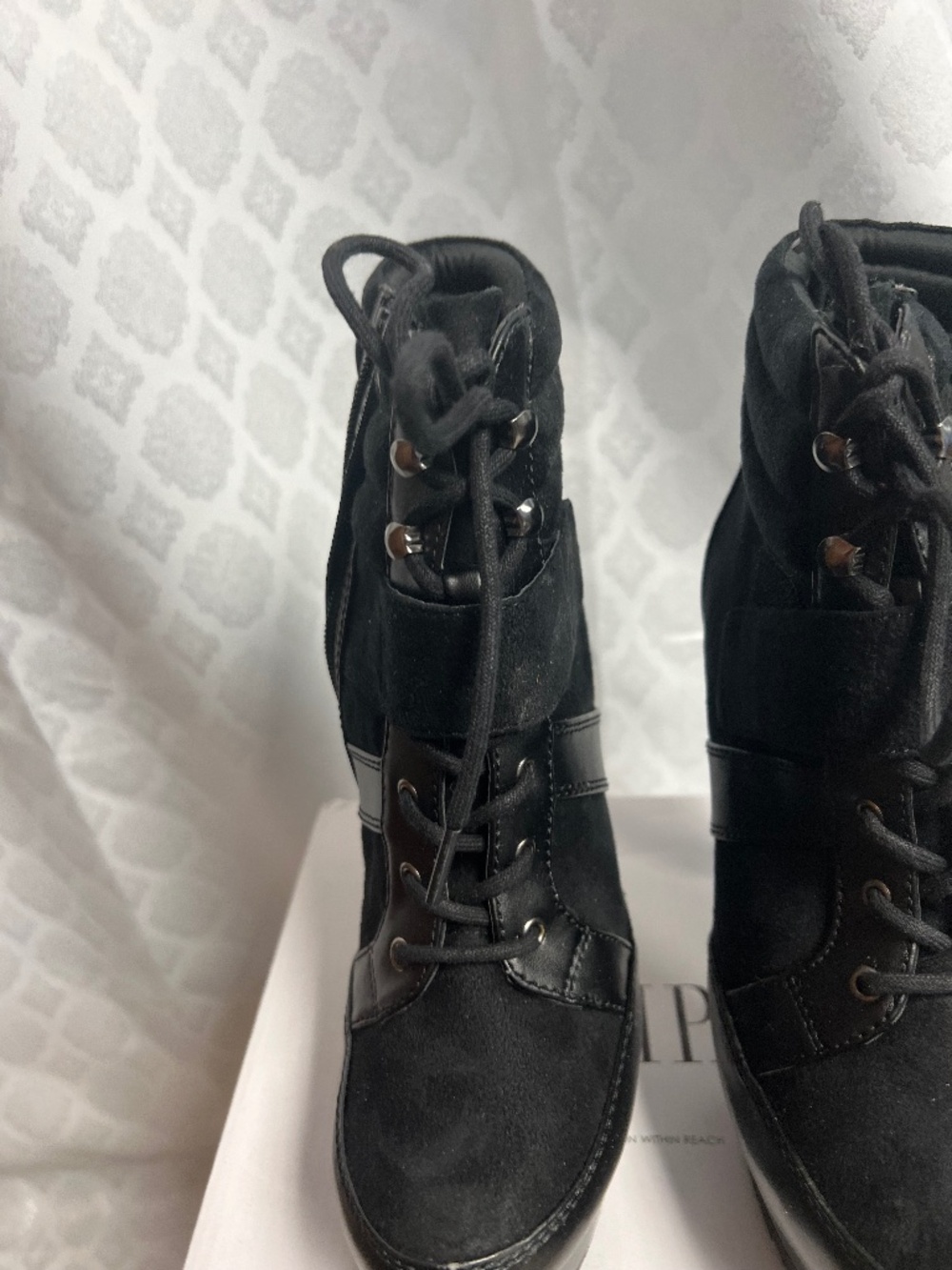 Jennifer Lopez lace up black booties